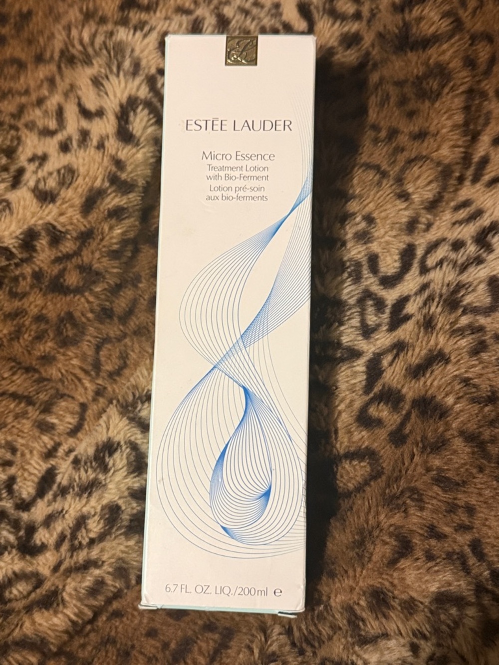 Estee Lauder Micro Essence Treatment Lotion - White with Blue Wave Design